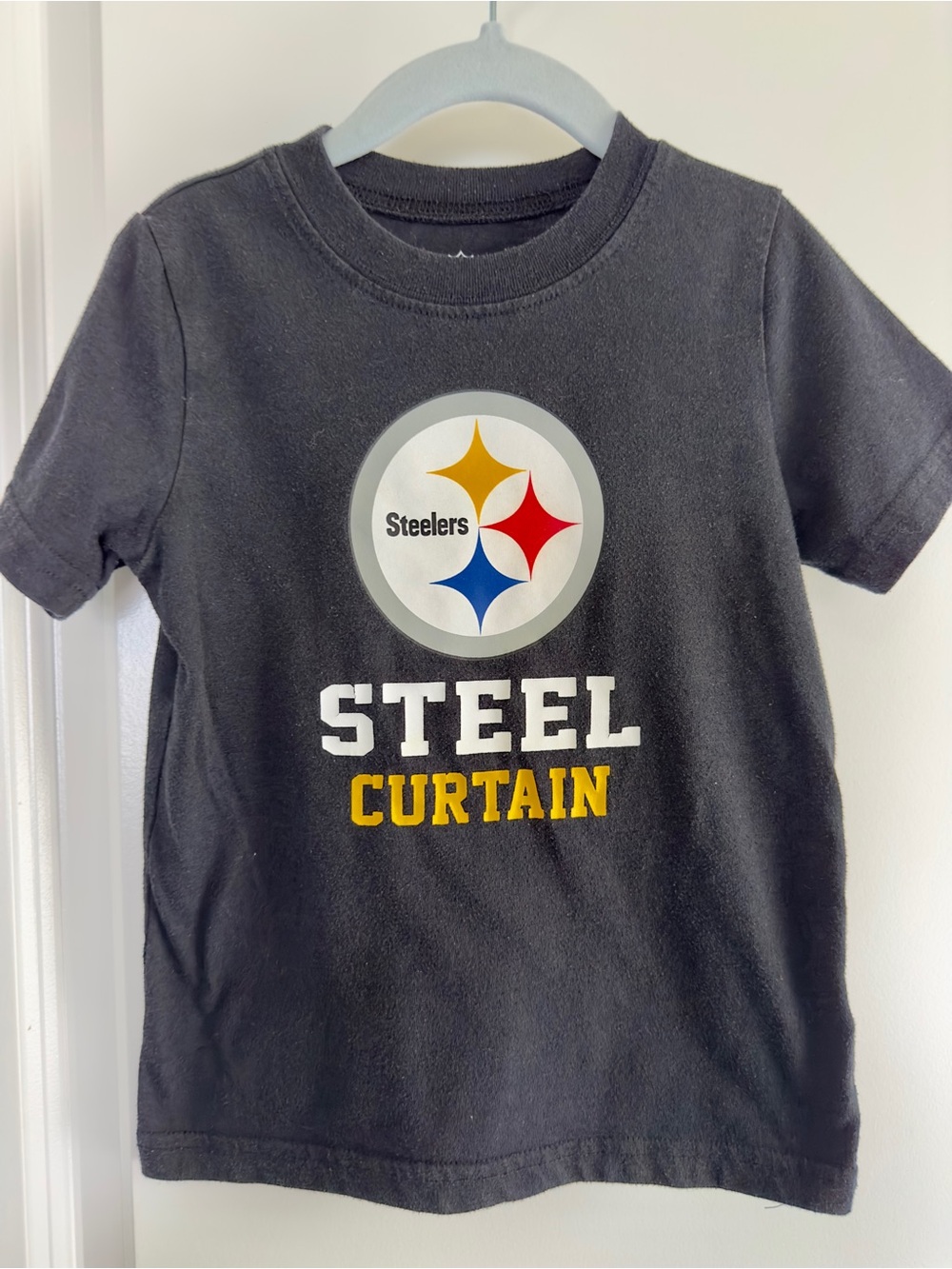 NFL Kids Steel Curtain T-Shirt - Black with Yellow, Red, Blue Accents